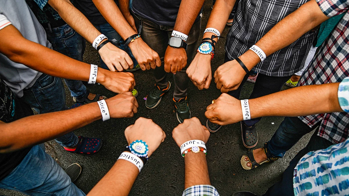 Junior doctors display 'We Want Justice' rakhis in Kolkata (photo: PTI)