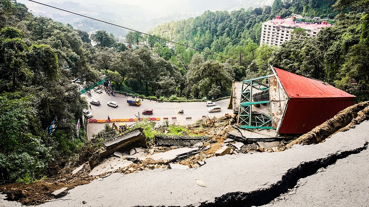 A road damaged by a massive landslide at Baluganj, in Shimla (photo: PTI) 