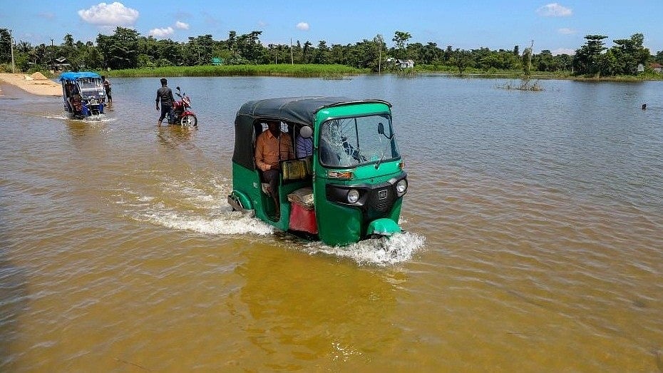 Rickshaws move through a flooded road in Bangladesh on 3 July 2022 (Photo: Xinhua/IANS)