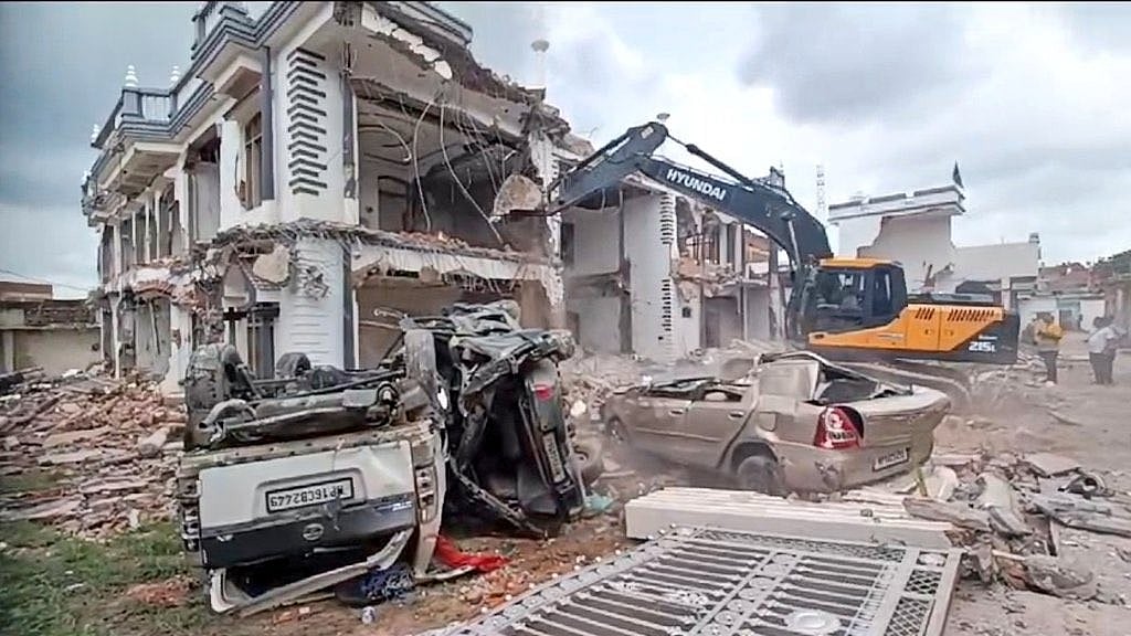 The latest in Madhya Pradesh's 'bulldozer justice' saw cars crushed and a house gouged on 22 August