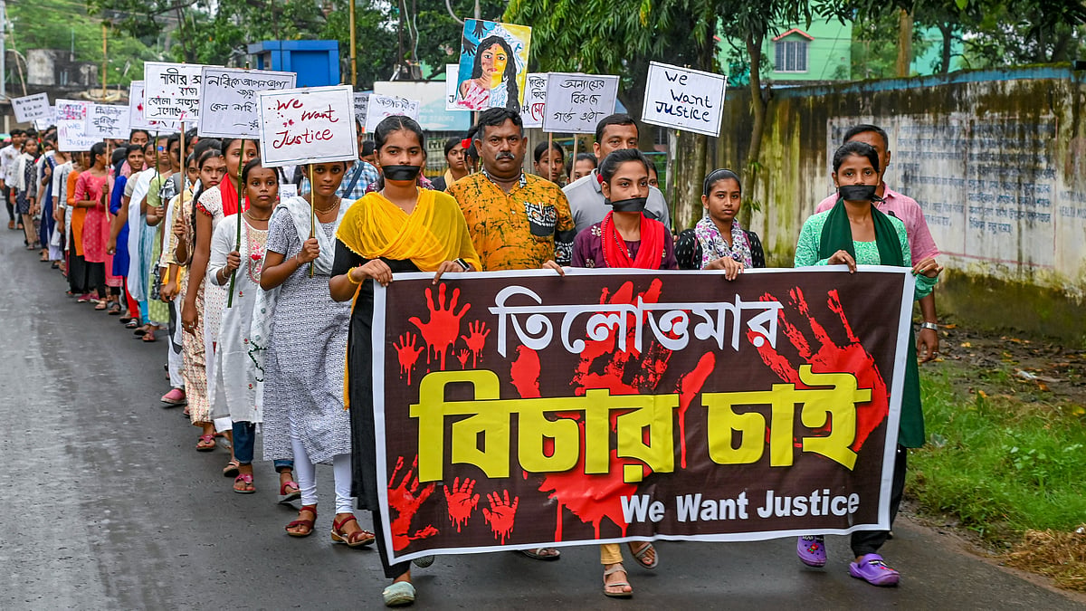 People participate in protest rally in Nadia on 22 August (photo: PTI)