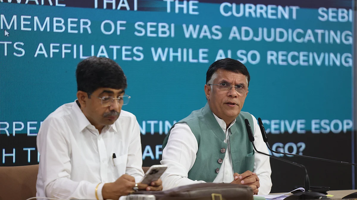 Congress leader Pawan Khera attends a press conference (photo: AICC)