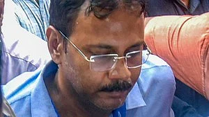 Sandip Ghosh being taken to Alipore court on 3 September (photo: IANS)