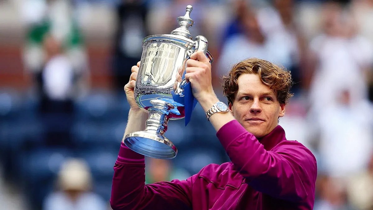 Jannik Sinner with the US Open trophy.