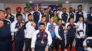 Paralympics medallists touch down to a warm welcome in the capital