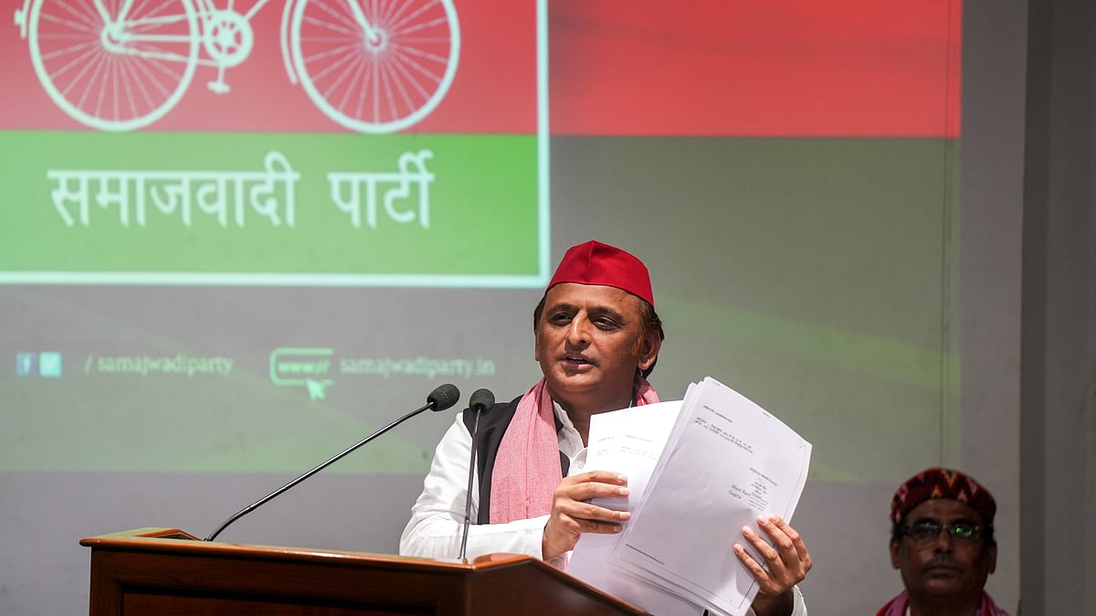 File photo of Akhilesh Yadav addressing a press conference (photo: PTI)