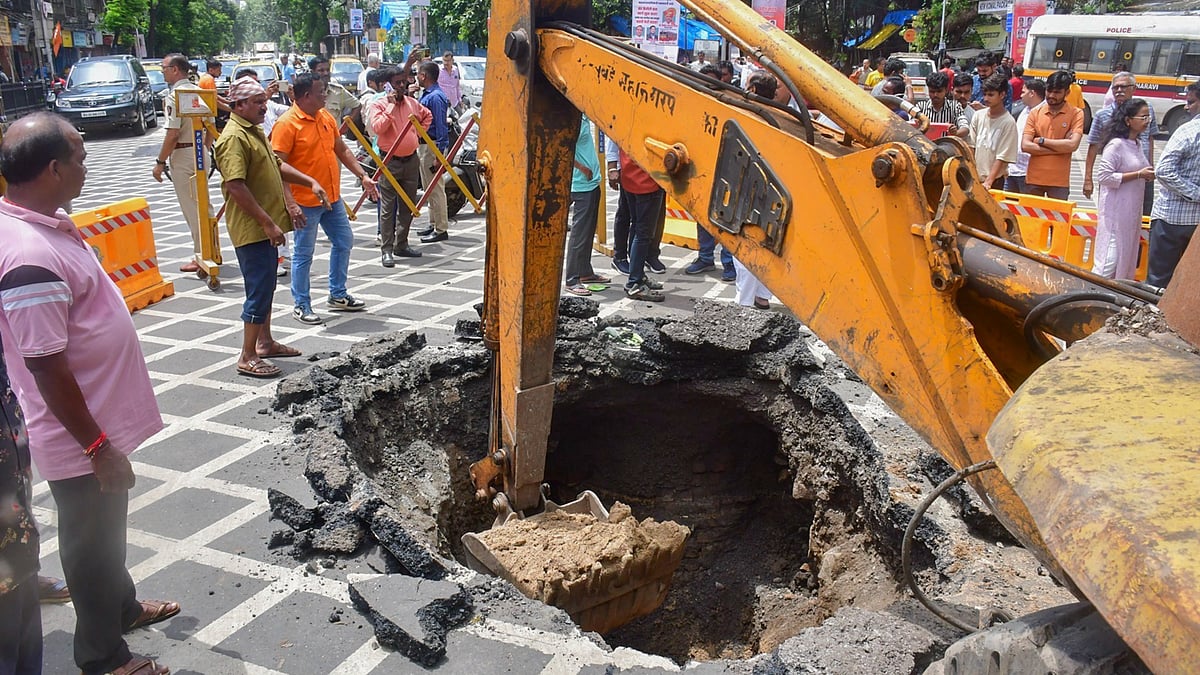Mumbai: Repair work being carried out by BMC after a road caved in