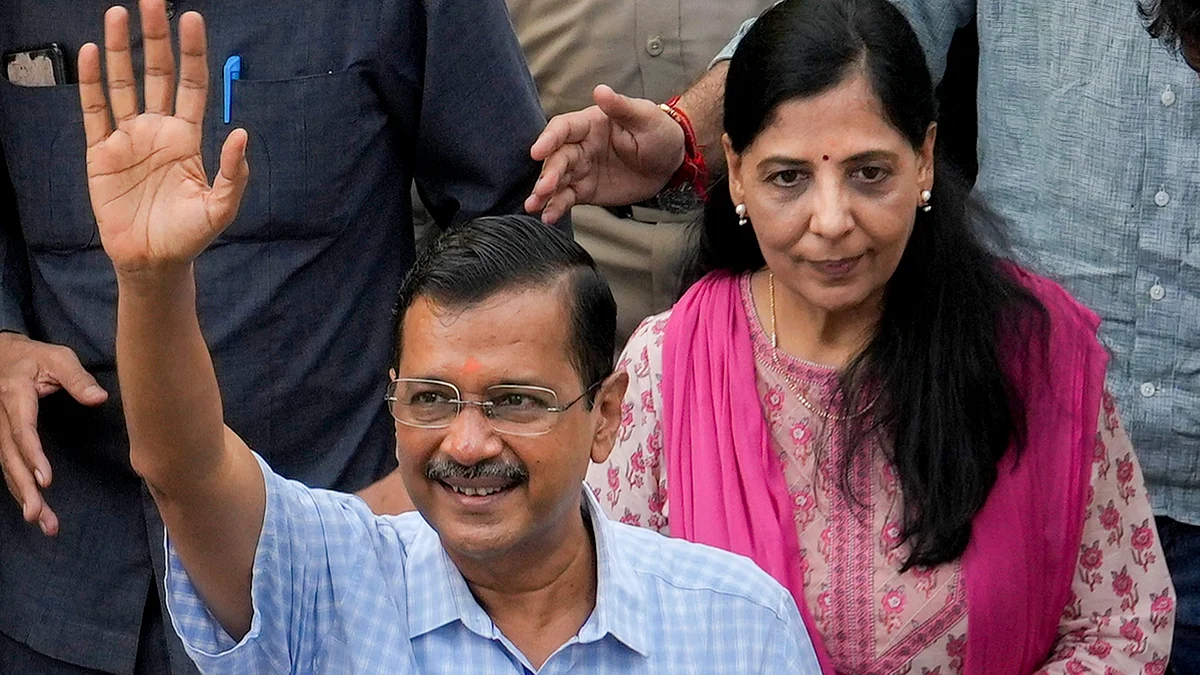 CM Arvind Kejriwal with Sunita Kejriwal in New Delhi on 14 September (photo: PTI)