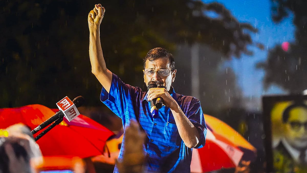 CM Arvind Kejriwal addresses supporters in New Delhi on 13 September (photo: PTI)