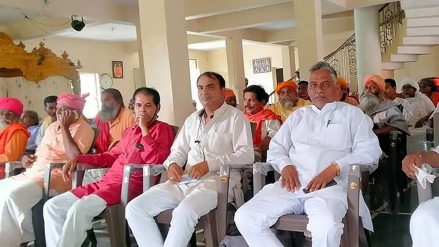 A purported photo of Govind Nat (far right) at an event