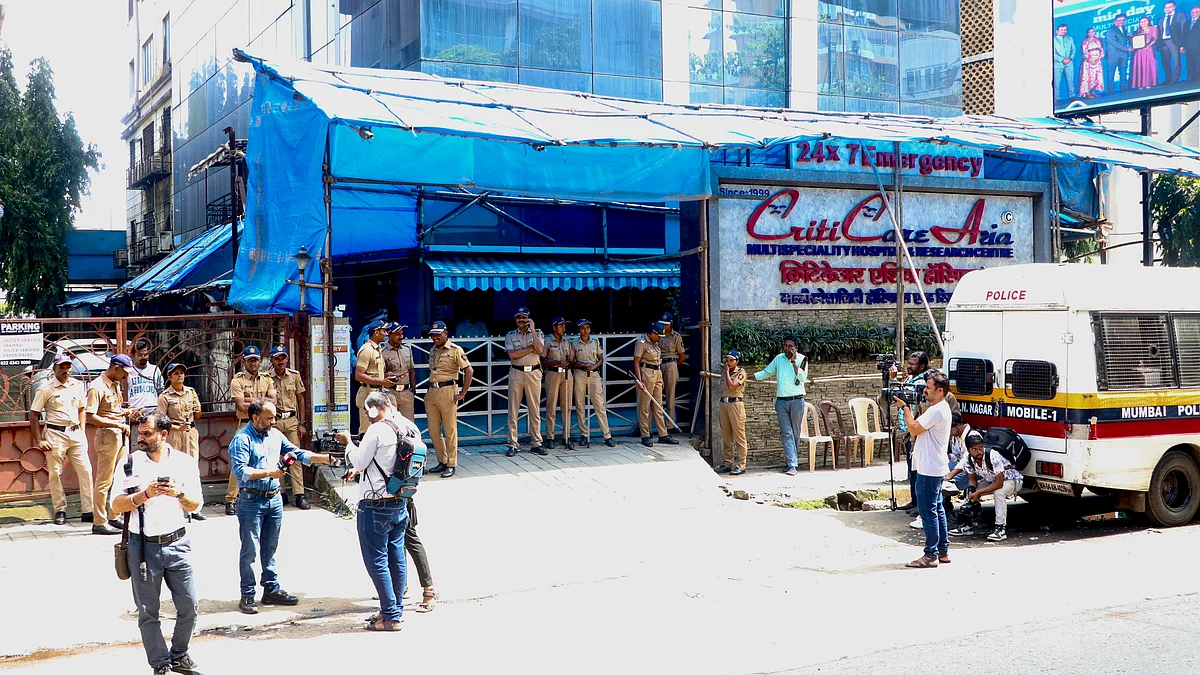 Policemen stand guard outside the hospital in Mumbai on 1 October (photo: PTI)