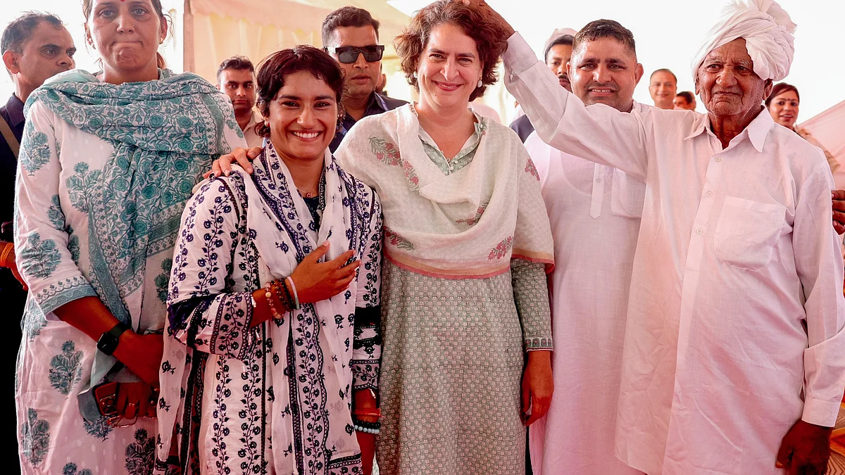 Priyanka Gandhi and Vinesh Phogat in Julana (photo: PTI)