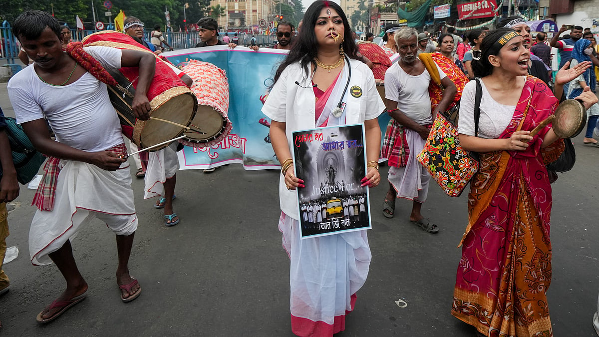 Junior doctors participate in a mega rally in Kolkata on 2 October (photo: PTI)