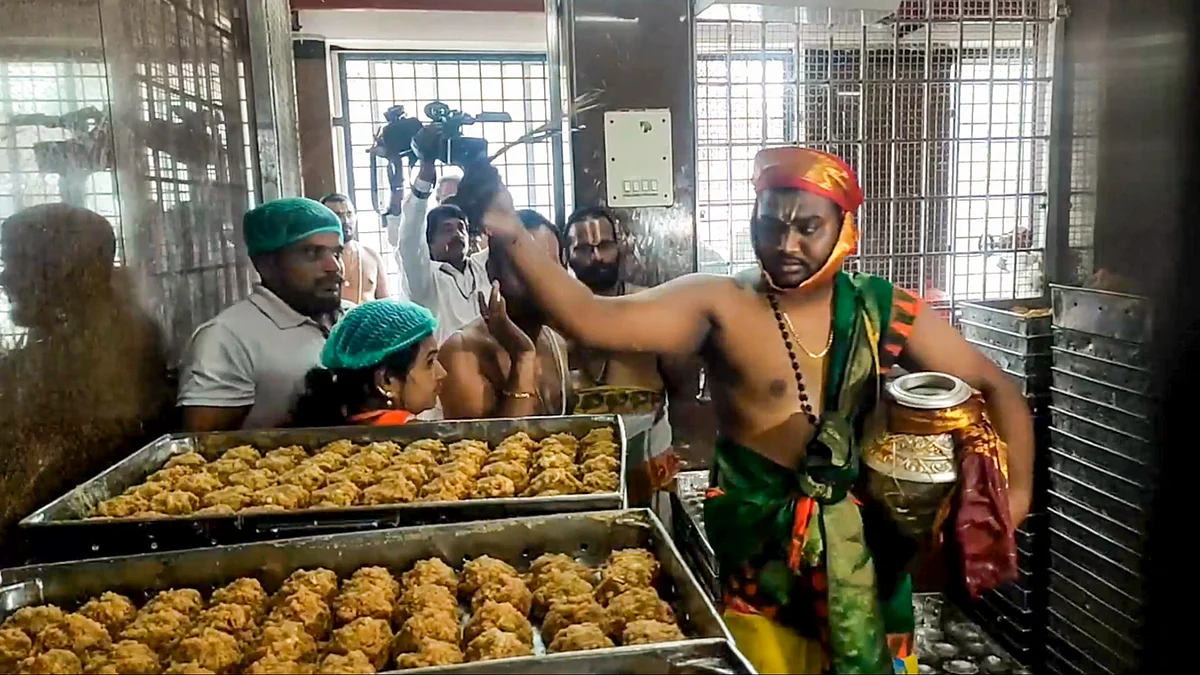 A priest performs purification ritual at Tirumala on 23 September
