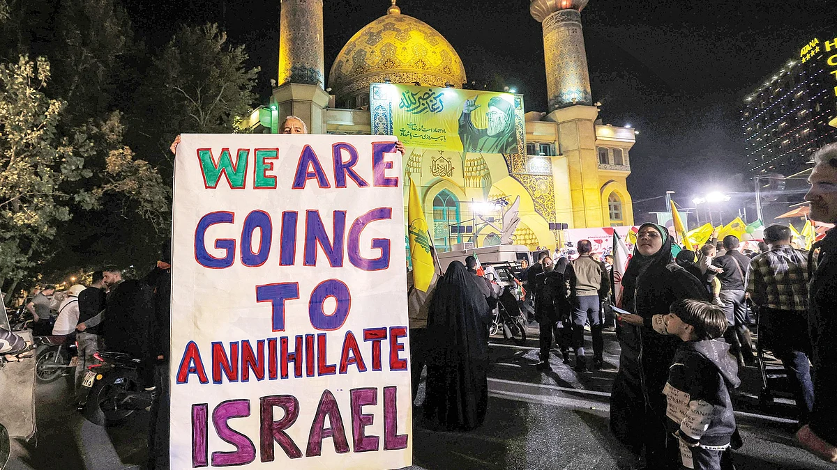 People in Tehran celebrate Iran's missile attack on Israel, 1 October 2024