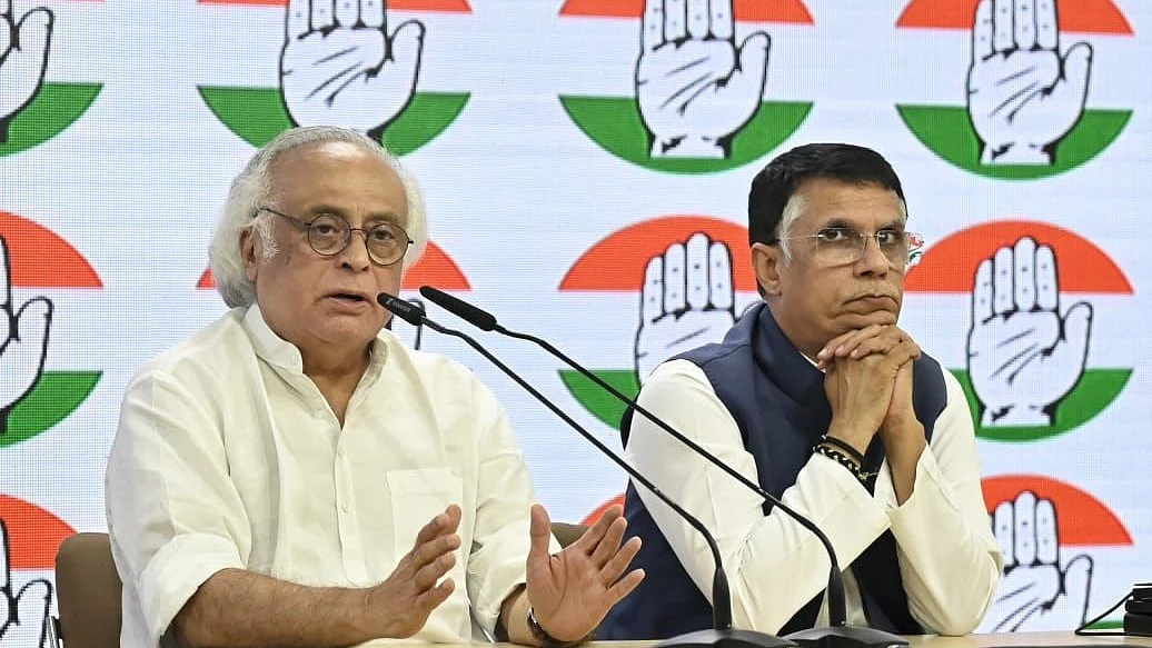 Congress leaders Jairam Ramesh and Pawan Khera address a press conference in New Delhi (photo: Vipin)