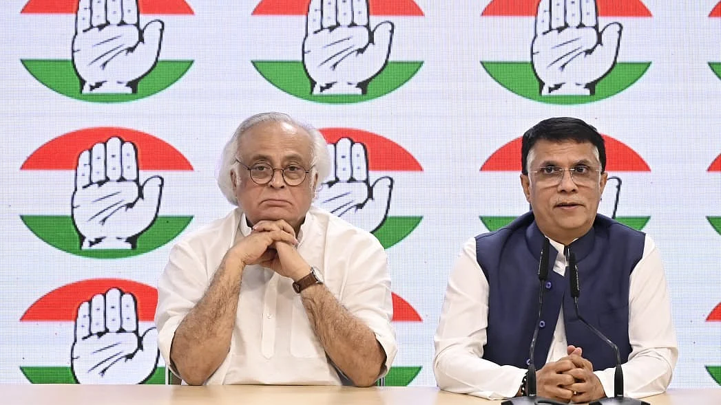 Jairam Ramesh and Pawan Khera at a press conference in New Delhi (photo: Vipin/National Herald)