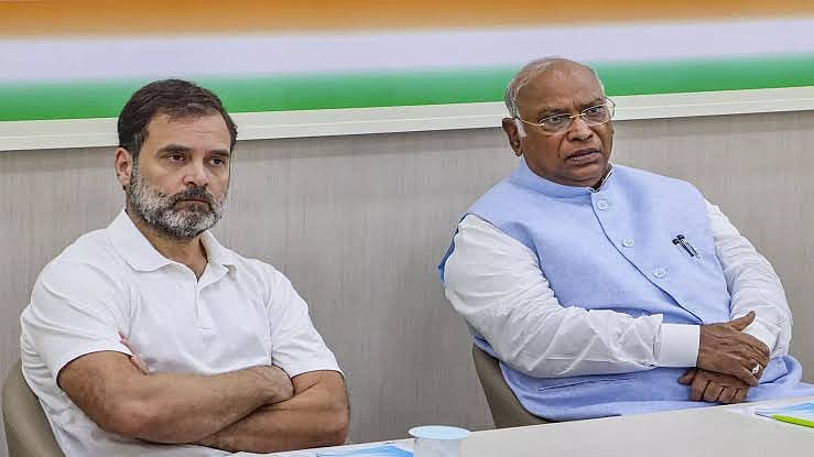 Congress leaders Rahul Gandhi (left) and Mallikarjun Kharge