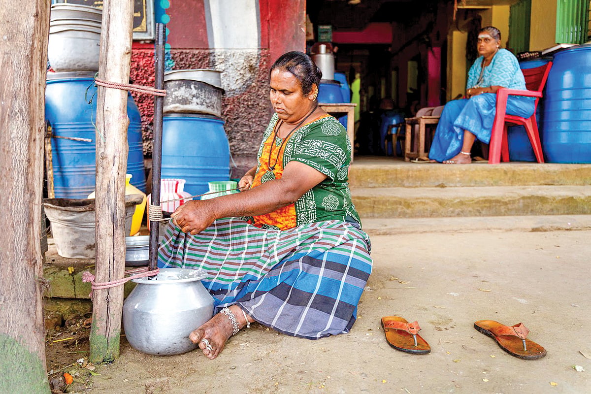 Selvi Amma’s daughter Mayakka churns milk into home-made butter