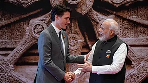 Sync failure: Trudeau (left) and Modi (right)