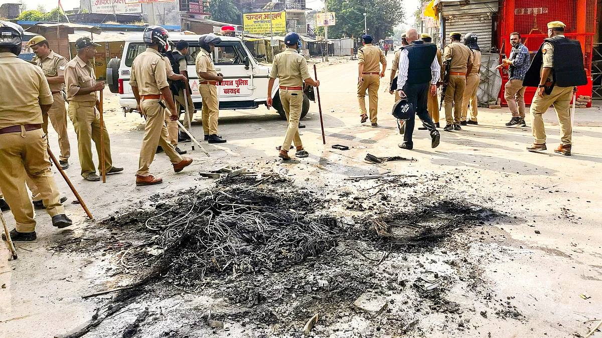 Police patrol the streets after communal violence in Bahraich