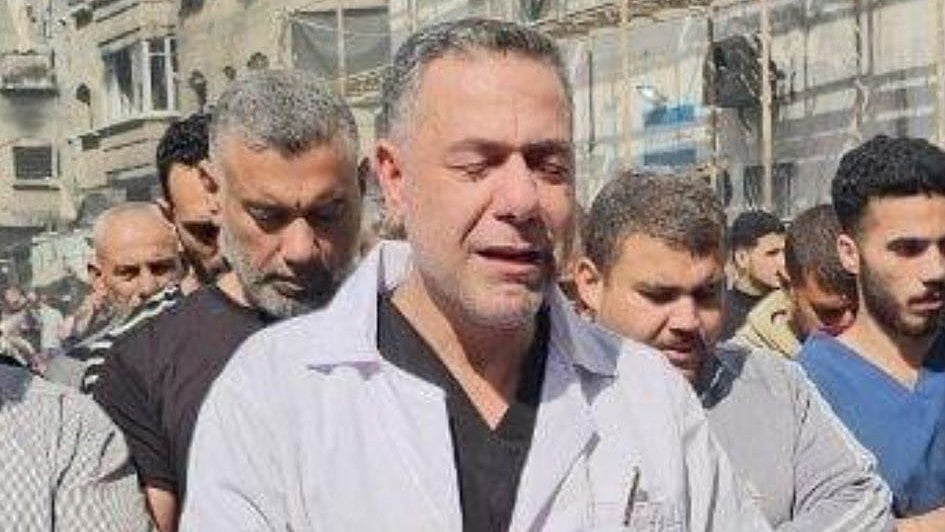Dr Hossam Abu Safia, director, Kamal Adwan Hospital, prays for son Ibrahim, killed in the Israeli assault