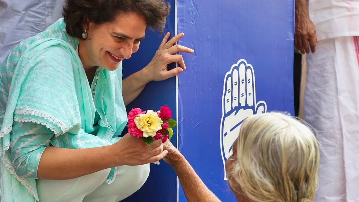 File photo of Priyanka Gandhi Vadra accepts flowers while campaigning in Wayanad