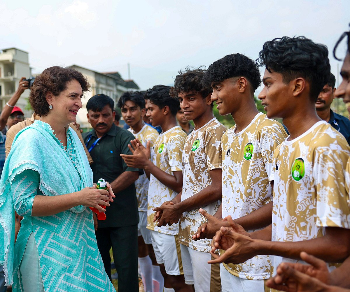 Priyanka Gandhi Vadra greeting a team of youths on her Wayanad campaign