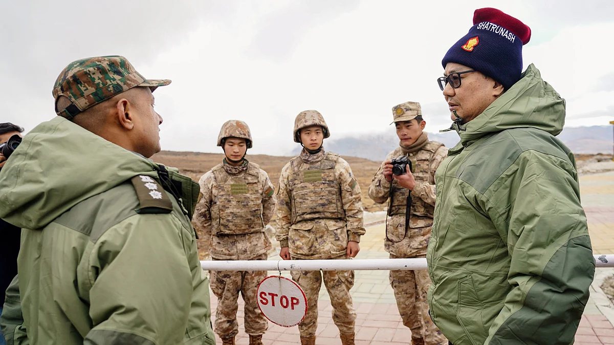 Kiren Rijiju with Chinese soldiers in Tawang (photo: PTI)