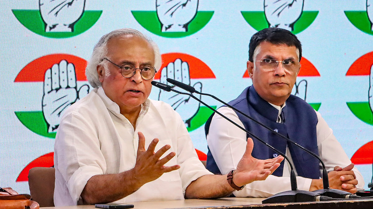 Congress leaders Jairam Ramesh and Pawan Khera address a press conference at AICC headquarters