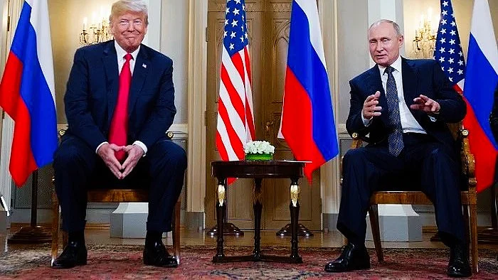 Russian President Vladimir Putin with Trump (photo: @BRICSinfo/X)