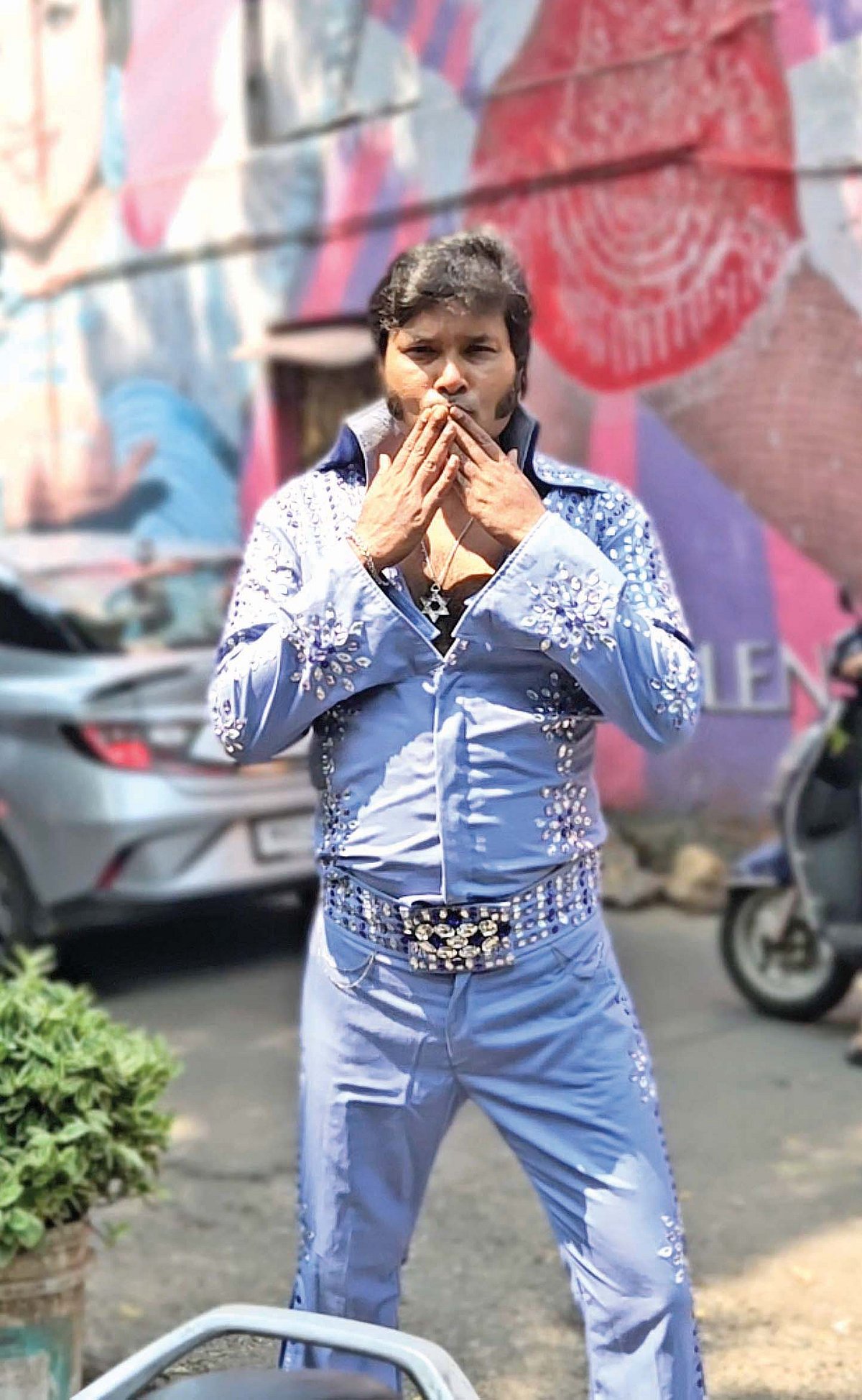 Sid Meghani in his Elvis paraphernalia