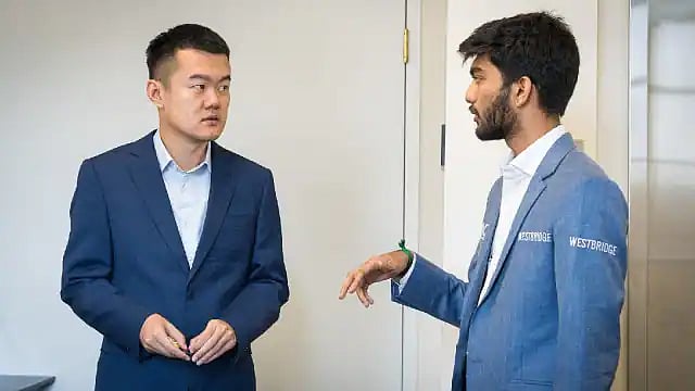 Face-off: D. Gukesh (right) and Ding Liren, the reigning world champion (photo: Fide)