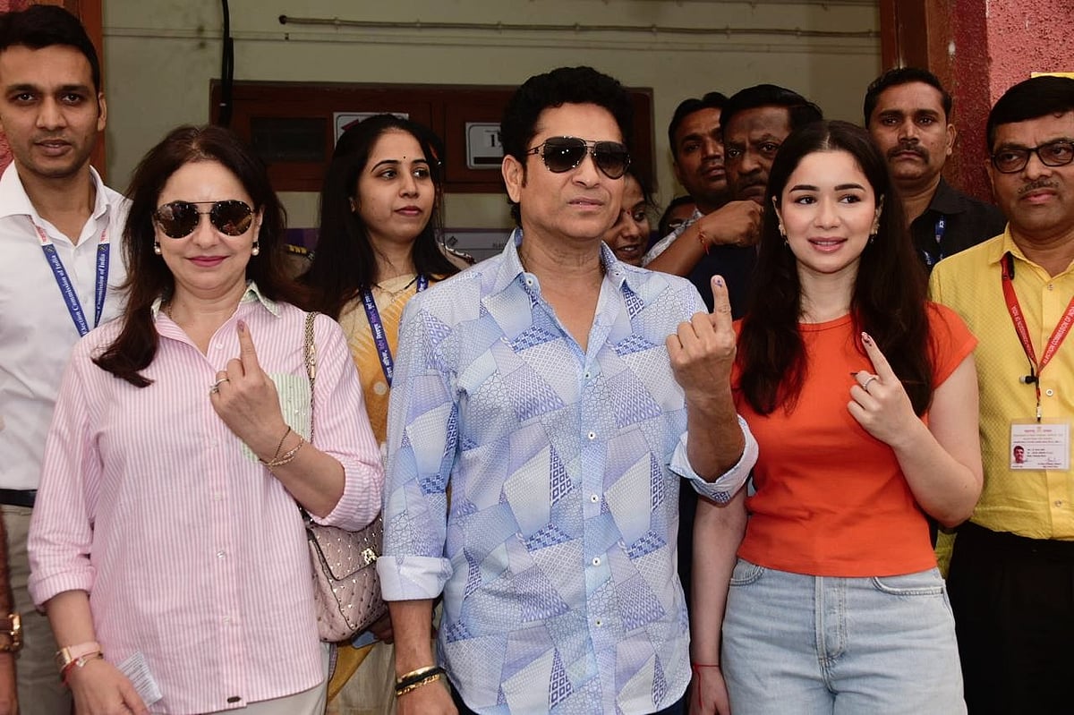 From left: Anjali, Sachin and Sara Tendulkar at a polling booth (photo: @ECISVEEP/X