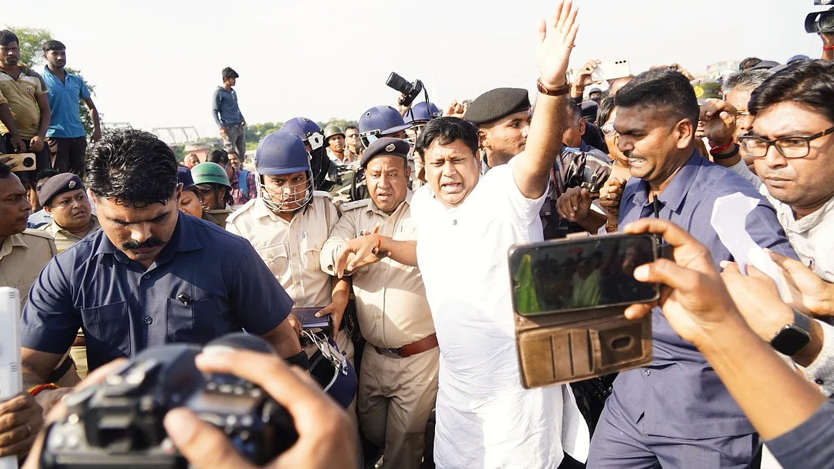Sukanta Majumdar being arrested (photo: @DrSukantaBJP/X)