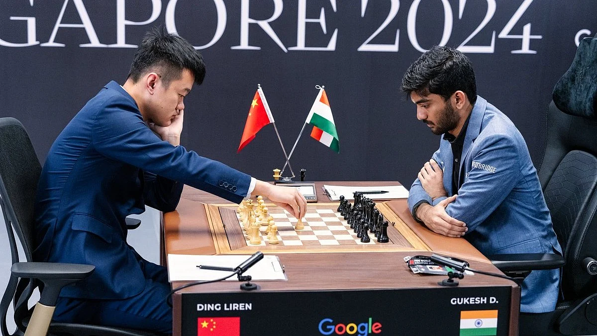 Defending champion Ding Liren of China opens with white against 18-year-old D. Gukesh of India