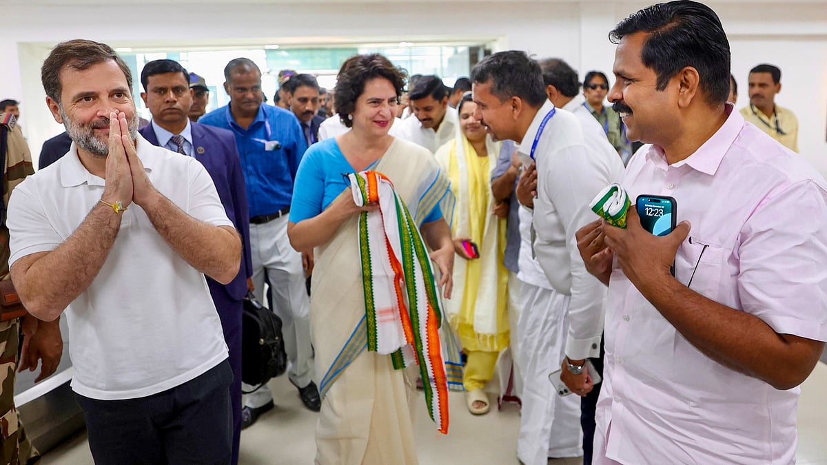 Rahul Gandhi and Priyanka Gandhi in Kozhikode on 30 November (photo: PTI)