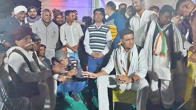 Sachin Pilot at a farmer's house near Jaipur on 5 December (photo: IANS)