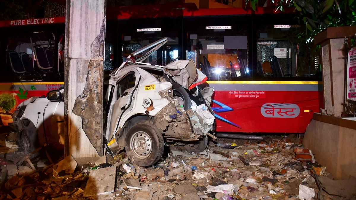 Wreckage of a car after the bus collides with several vehicles in Mumbai on 9 December (photo: PTI)