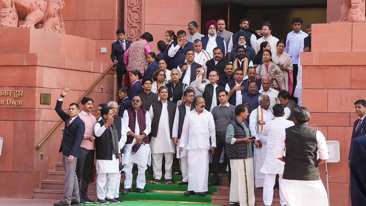 Gaurav Gogoi with other INDIA bloc MPs protests in New Delhi on 10 December (photo: PTI)