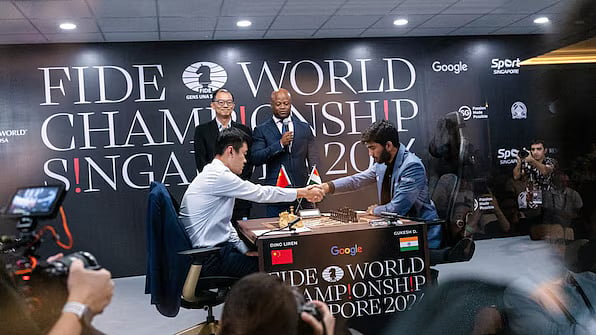 D. Gukesh (right) and Ding Liren after a game (photo: FIDE)