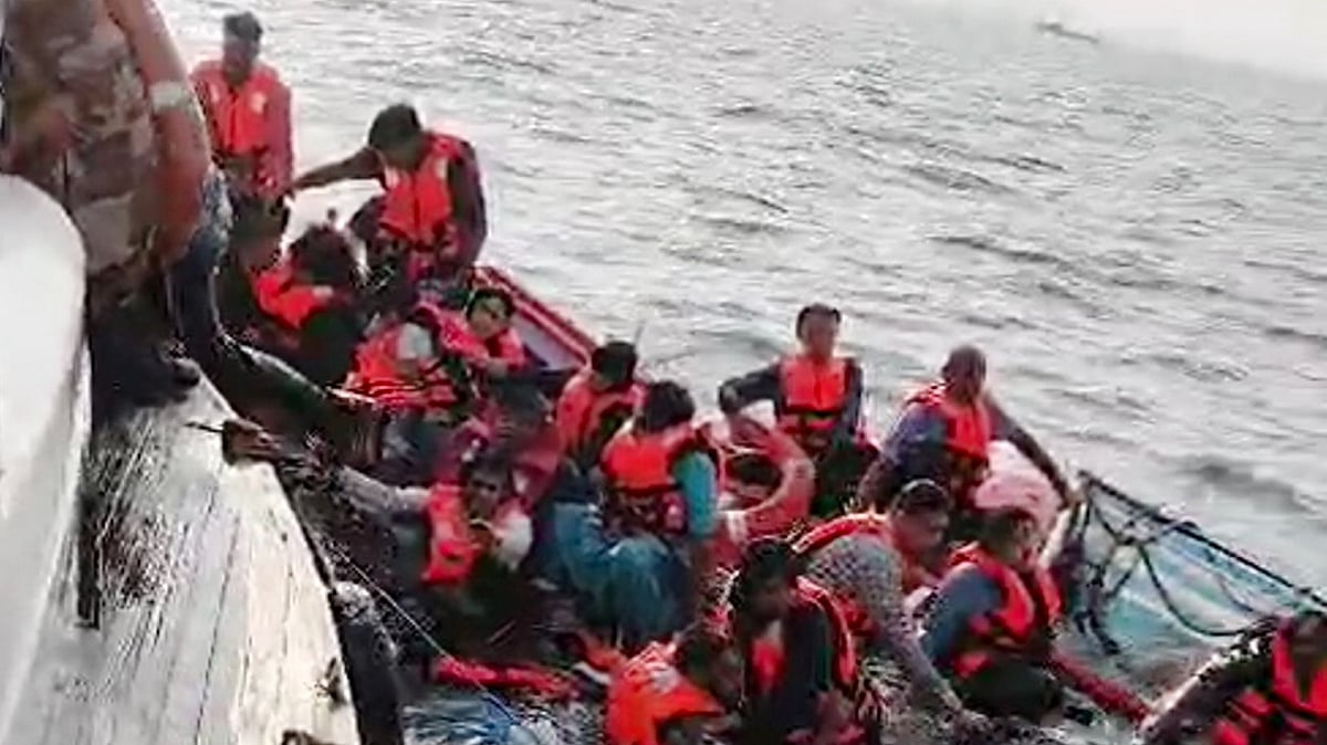 Passengers being rescued from the launch (photo: PTI)