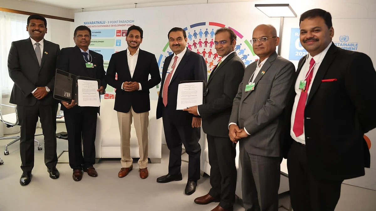 Y.S. Jagan Mohan Reddy with Gautam Adani in 2022 when the Andhra govt signed an MoU with Adani Green