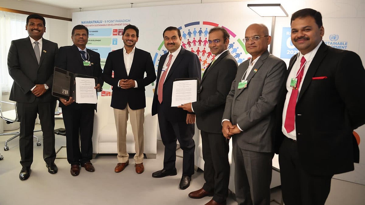 Y.S. Jagan Mohan Reddy with Gautam Adani in 2022 when the Andhra govt signed an MoU with Adani Green