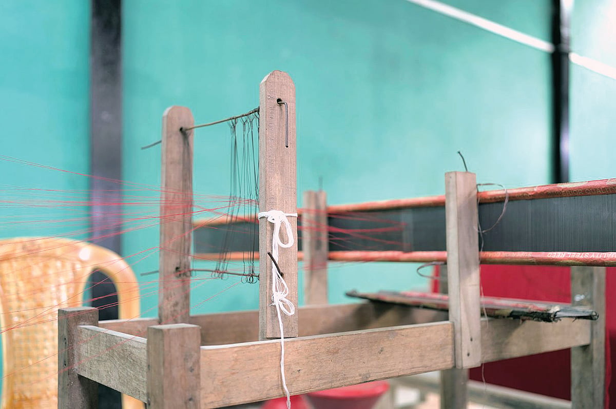 The handloom frame Jamini Payeng works on