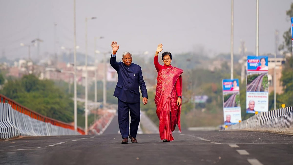 Atishi and Delhi minister Ram Niwas Goel inaugurate a new flyover (photo:
@AamAadmiParty/X)