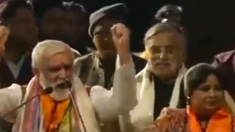 Screengrab from video showing Ashwini Choubey and the singer 