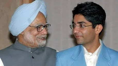 'Humility, wisdom, quiet strength': Abhinav Bindra (right) saw a role model in Manmohan Singh (L)