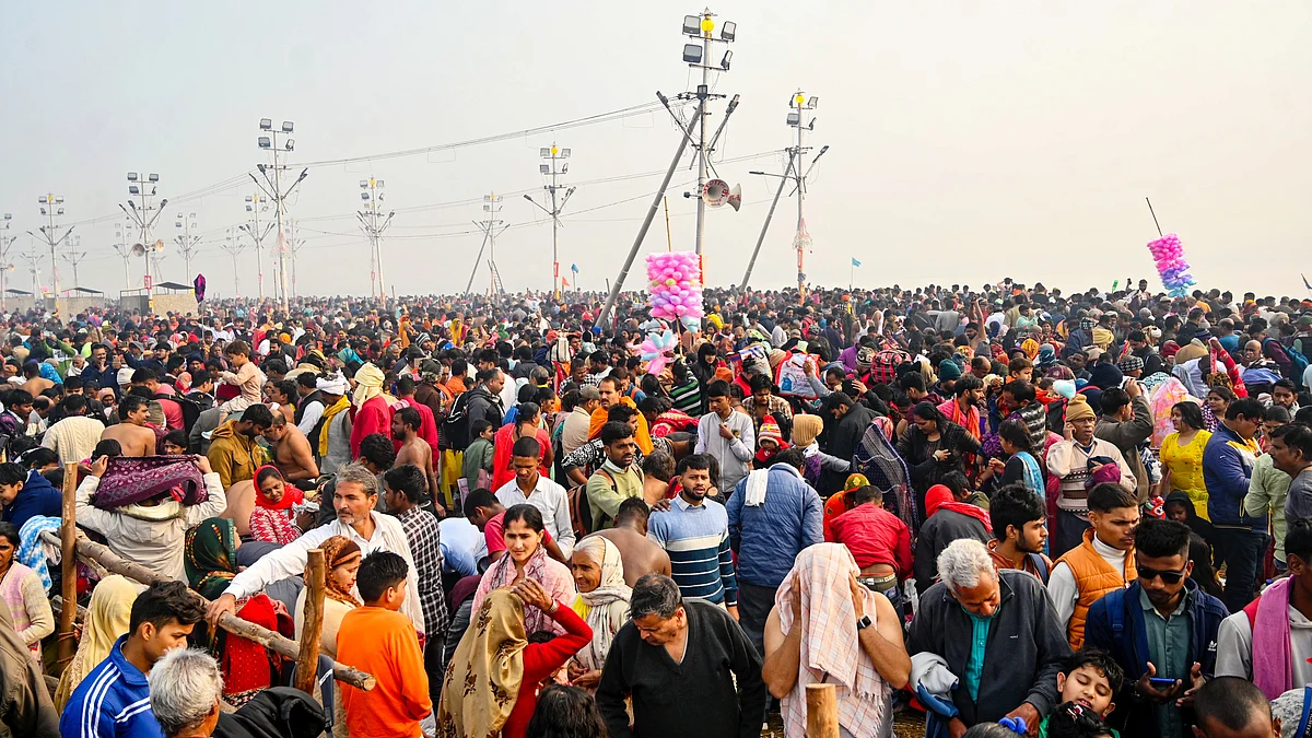File photo of devotees gathering for a holy dip at Maha Kumbh  (photo: PTI)