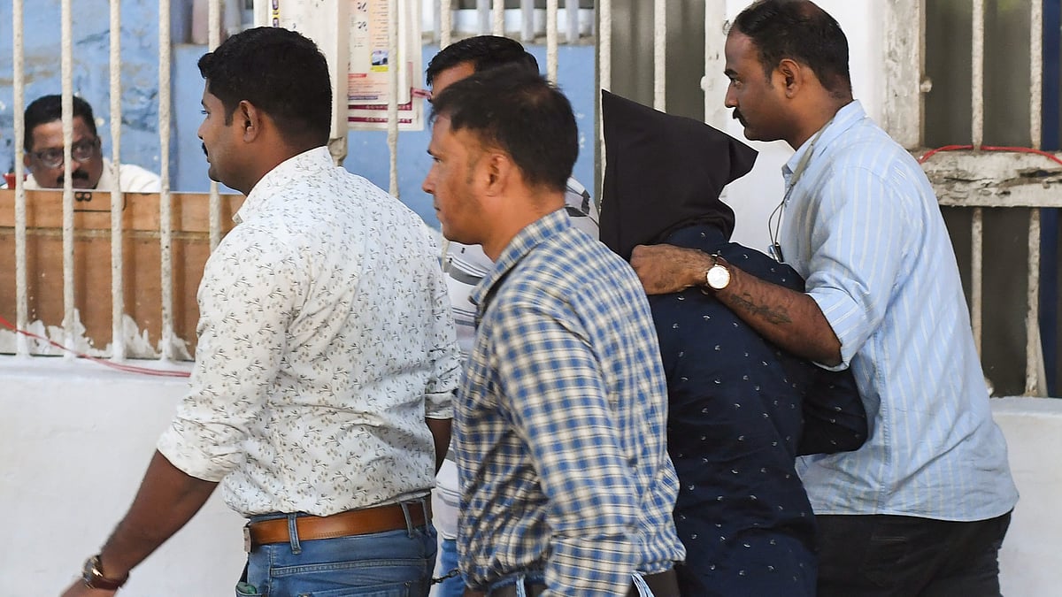 The 'accused' being produced at a court in Mumbai on 24 January (photo: PTI)